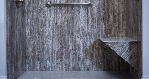 Shower surround mimicking the look of gray marble. 
